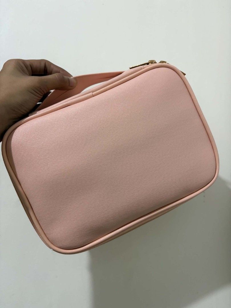 Pink Cosmetic Bag Organizer (Category: Purses & Pouches) located in Caloocan City. Submitted by vcsmartine20166 (Listing ID 1464253055, Image 1). Description: - Adorable pink cosmetic bag - Convenient handle for easy carrying - Secure zipper closure - Internal compartments specifically for makeup brushes - Spacious main compartment for all your essentials - Ideal for travel or everyday organization - Keeps your makeup neatly organized.