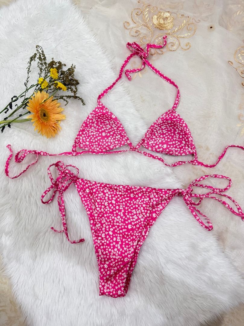 Pink Floral Two Piece Swimsuit (Category: Bikinis & Swimsuits) located in Mandaluyong City. Submitted by prelovedbyrinoa_ (Listing ID 1464347931, Image 1). Description: Cute and versatile swimsuit, perfect for beach days, pool trips, and vacations! 🌴✨ • Padded • Pink floral print • Flattering & comfortable fit • Brand new • Good condition.
