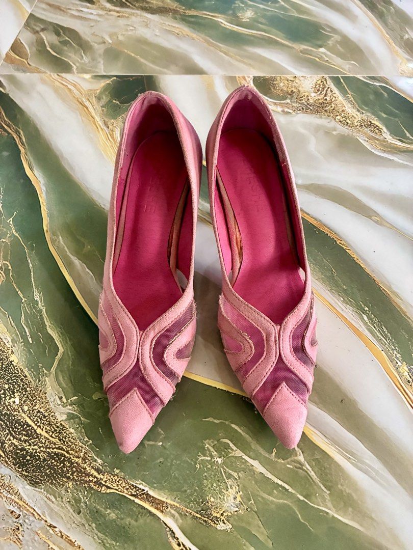 Pink Suede Mesh Pointed Toe Heels (Category: Heels) located in Tabuk. Submitted by twotimestooo (Listing ID 1464175324, Image 2). Description: - Stunning pink suede heels - Elegant mesh detailing - Unique curved heel design - Pointed toe for a sophisticated look - Ideal for dressing up any outfit - Minor scuffs on soles and heels.