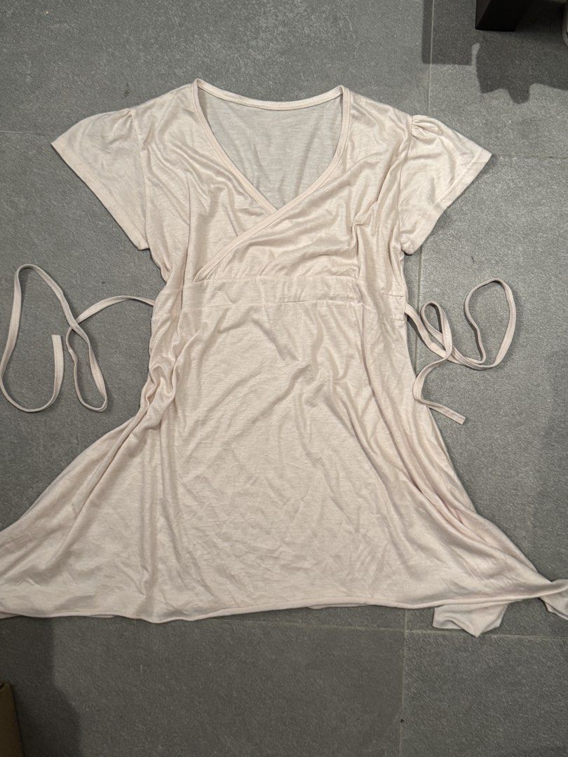 Pink wrap top with tie waist (Category: Dresses) located in Manila. Submitted by smnthsa (Listing ID 1463018571, Image 2). Description: - slightly asymmetrical hemline - can self-tie for better fit - can also be dress over jeans.