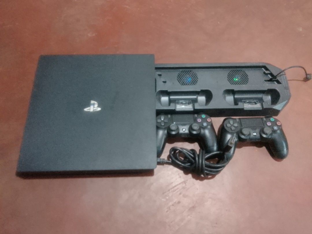 PLAYSTATION 4 PRO 1TB (Category: PlayStation) located in Manila. Submitted by vincethegreat16 (Listing ID 1464261485, Image 1). Description: INCLUSION: 1 VERTICAL STAND HOLDER 2 CONTROLLER 1 HDMI.