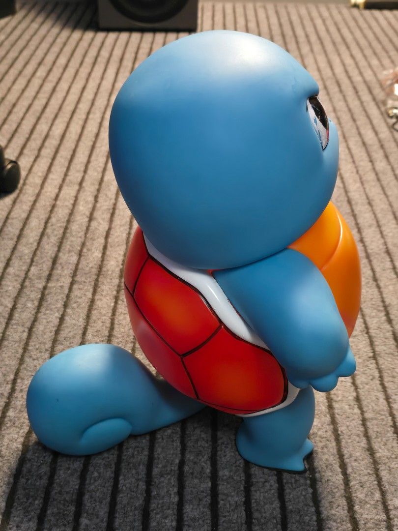 Pokemon Squirtle Figure Toy (Category: Figurines & Statues) located in Baguio. Submitted by sonny14 (Listing ID 1464180836, Image 2). Description: PVC or vinyl [1:1 scale life-size / approx. 16-17 inch Squirtle figure from Pokémon featuring an annoyed or "tsundere" facial expression with furrowed brows. Size: Approximately 16 to 17 inches (around 40–43 cm) tall as measured by the tape. Issues.light scratches and eye paint issue Pm for more detail
