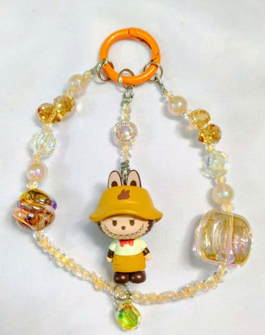 popmart popbeans labubu with hat charms (Category: Charms) located in Caloocan City. Submitted by jark_moonshop (Listing ID 1464257963, Image 1). Description: authentic popmart popbeans DIY charms with marking. gift pouch and transparent blank tag is available with extra fee of 10pesos per set of pouch and blank tag for tag price can do lalamove or JNT .