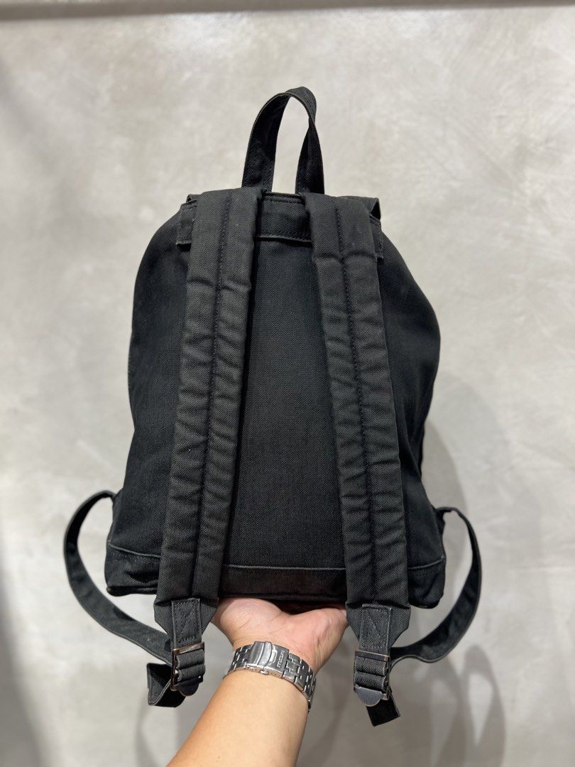 Porter Yoshida & Co - Smoky Rucksack (Category: Backpacks) located in Quezon City. Submitted by cityboycrates_ph (Listing ID 1464304211, Image 3). Description: Size: OS Material: Canvas Made In: Japan Condition: Very Good Color rate: 9.5/10 Issue: None Exact metrics shared upon inquiry. Take a quick moment to double-check the size & condition. Once an order is placed and confirmed, we may not be able to make changes or offer cancellations/refunds