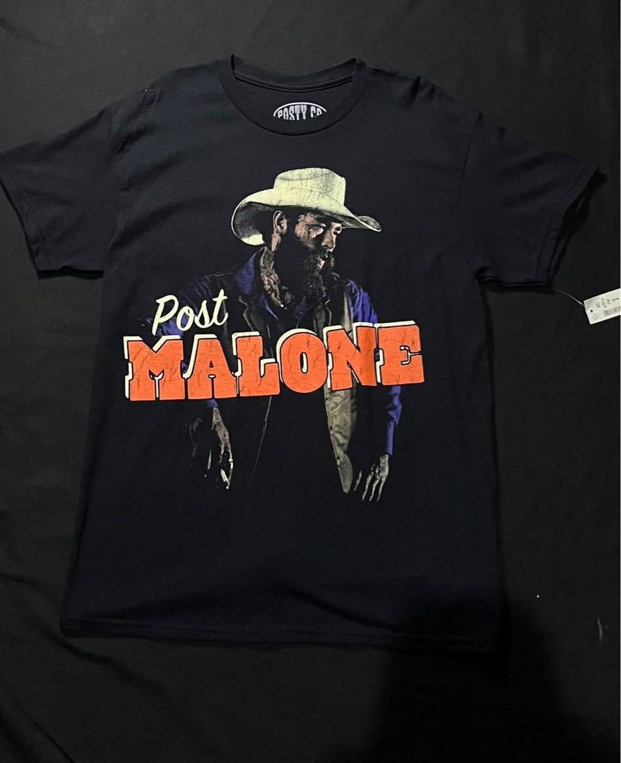 Post Malone "Posty Co." Graphic T-Shirt (Category: Tshirts & Polo Shirts ) located in Manila. Submitted by w1seman (Listing ID 1464166941, Image 1). Description: - Authentic Post Malone graphic t-shirt - Features 'Posty Co.' logo on tag - Made from 100% premium cotton - Imported directly from the US - Original tag still attached - Retail value: $38.95 - Size: Small.