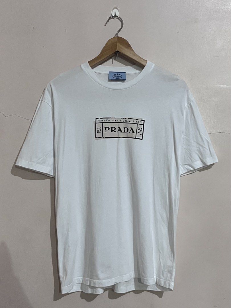 PRADA TEE (Category: Tshirts & Polo Shirts ) located in Matanao. Submitted by eyyymar (Listing ID 1464256007, Image 1). Description: Prada Logo Ticket T-shirt -Dimes:19.5x26.5 -Good as new -Issue:None .