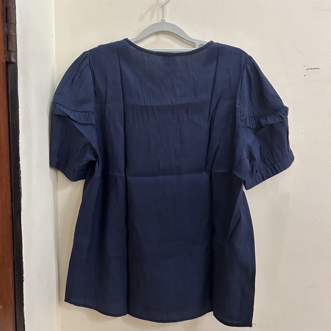 Preloved | Navy Blue Blouse (Category: Blouses) located in Caloocan City. Submitted by trisdeclutters (Listing ID 1464228970, Image 2). Description: Last price already Bust: up to 40" Length: 23" Puffed sleeves No flaws, good as new ‼️no reservations, exchange, cancellation, return, refund‼️.