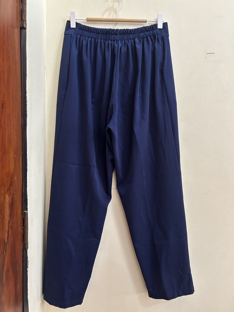 Preloved | Navy Blue Trouser Pants (Category: Other Bottoms) located in Caloocan City. Submitted by trisdeclutters (Listing ID 1464240931, Image 2). Description: Last price already Waist: 28" to 42" (sagad 44") Length: 38" Rise: 13" Hips: 44" Garterized back No flaws ‼️no reservations, exchange, cancellation, return, refund‼️.