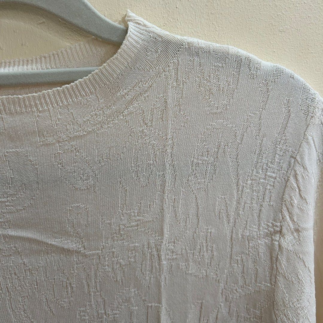 Preloved | Off-white Textured Knit Top (Category: Shirts) located in Caloocan City. Submitted by trisdeclutters (Listing ID 1464232509, Image 3). Description: Last price already Can fit up to L Relaxed bust: 32" Length: 22" Very stretchy No flaws, good as new ‼️no reservations, exchange, cancellation, return, refund‼️.