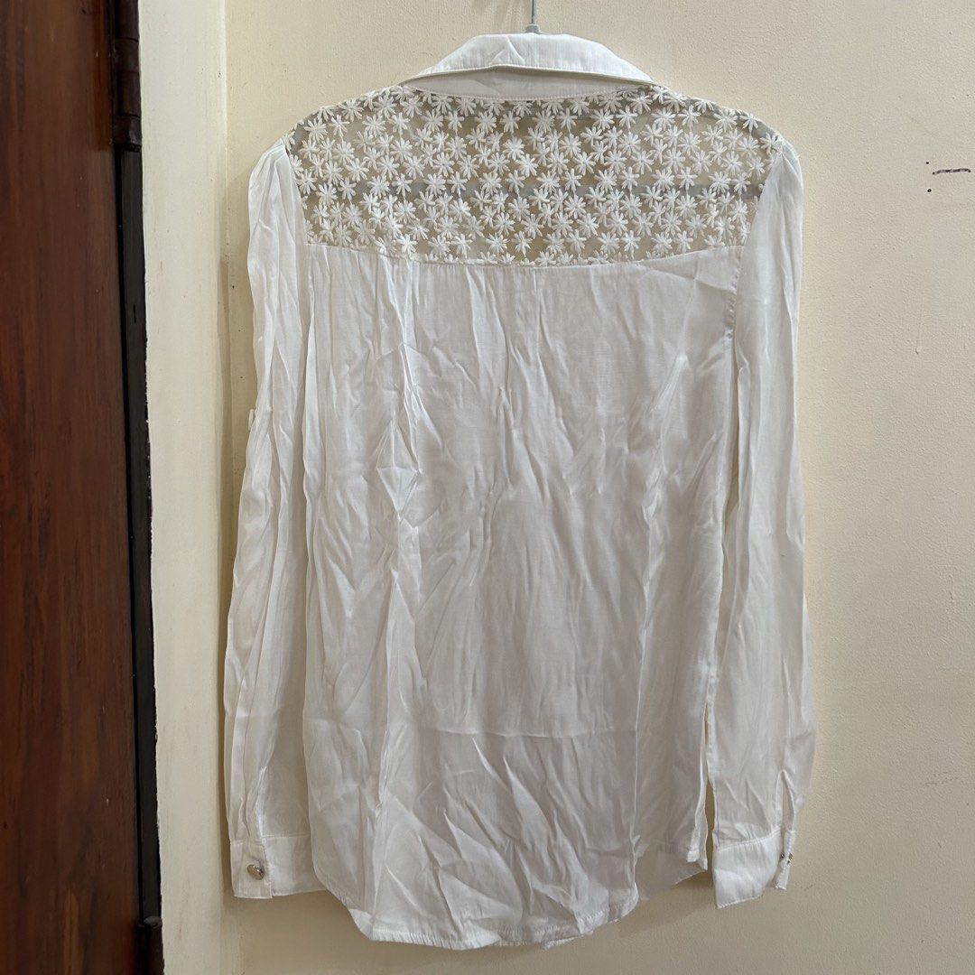 Preloved | White Laced-back Longsleeve Blouse (Category: Longsleeves) located in Caloocan City. Submitted by trisdeclutters (Listing ID 1464234347, Image 3). Description: Last price already Bust: up to 39" Length: 24" Sleeve length: 24" No flaws, good as new ‼️no reservations, exchange, cancellation, return, refund‼️.