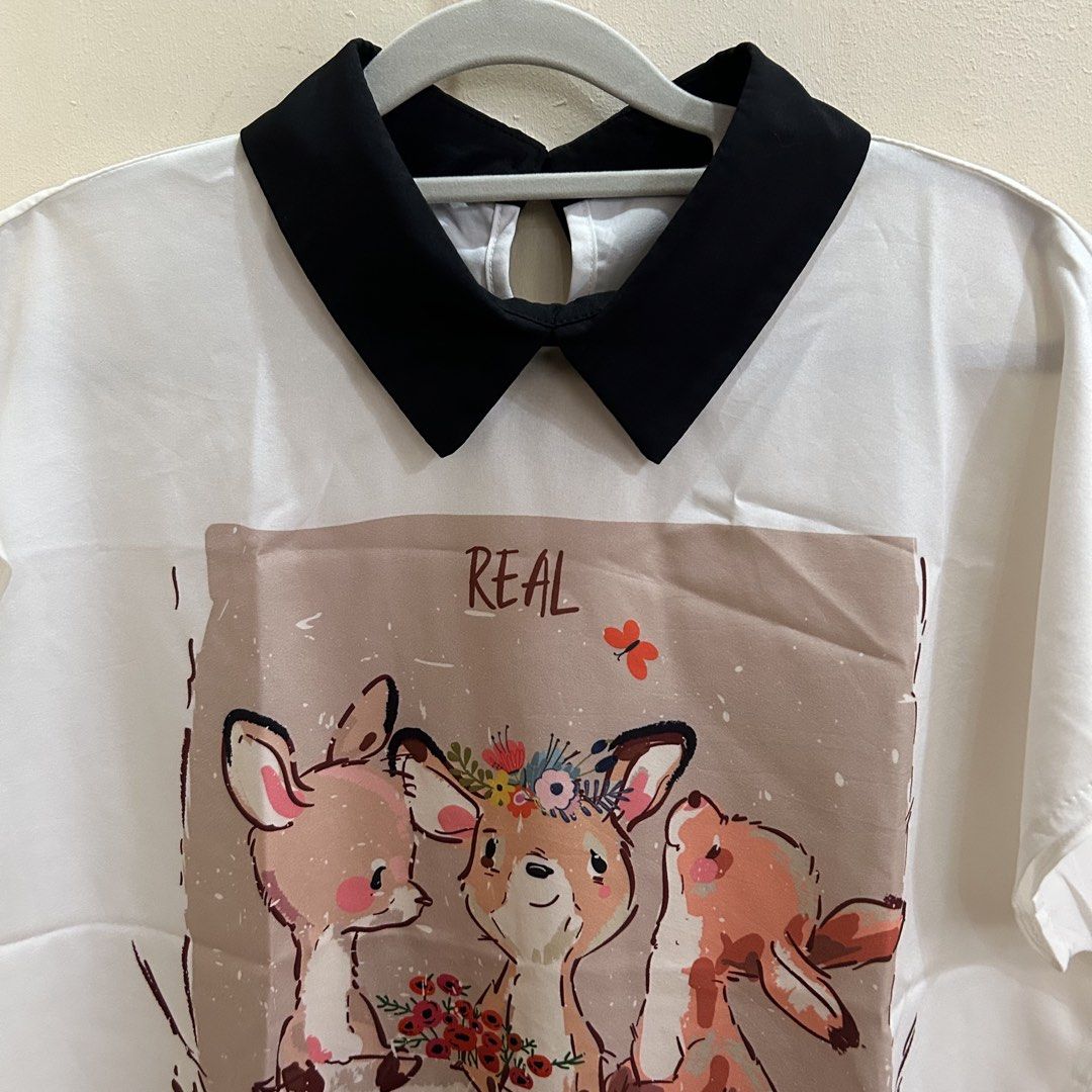 Preloved | White Printed Blouse with Collar (Category: Blouses) located in Caloocan City. Submitted by trisdeclutters (Listing ID 1464231809, Image 2). Description: Last price already Bust: up to 41" Length: 24.5" No flaws, good as new ‼️no reservations, exchange, cancellation, return, refund‼️.