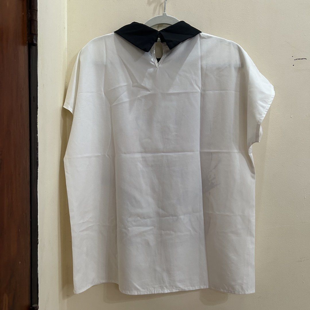 Preloved | White Printed Blouse with Collar (Category: Blouses) located in Caloocan City. Submitted by trisdeclutters (Listing ID 1464231809, Image 3). Description: Last price already Bust: up to 41" Length: 24.5" No flaws, good as new ‼️no reservations, exchange, cancellation, return, refund‼️.