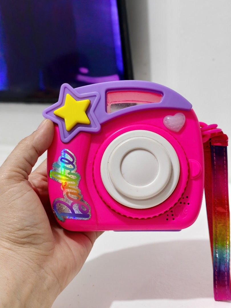 Preloved Barbie Photo Filter Play Camera (Category: Educational & Learning Toys) located in Pasig City. Submitted by dian.juliet (Listing ID 1464249783, Image 1). Description: ▪️Preloved from USA ▪️Battery Op / No battery / AS IS ▪️What you see is what you get. ▪️Colors may vary due to lightning. ▪️Flaws are barely noticeable. ▪️Feel free to message me for other details. :) 🖤 dian.