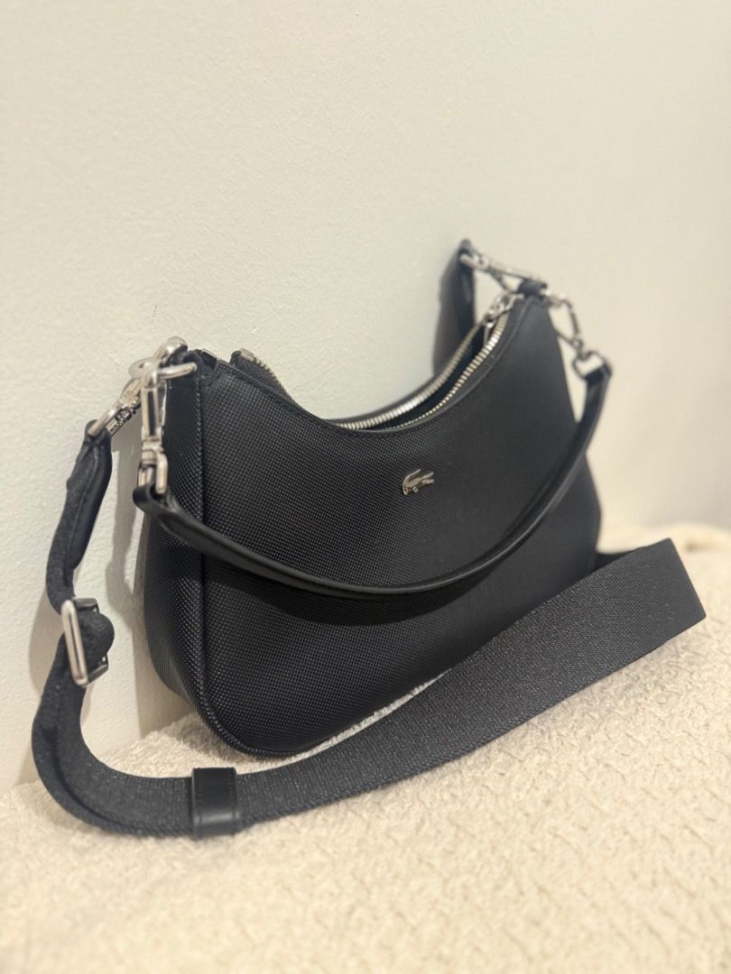 Preloved Lacoste shoulder/sling bag (Category: Shoulder Bags) located in Caloocan City. Submitted by cleverowl.79e50e (Listing ID 1464332997, Image 1). Description: Lacoste Daily City Bag - Complete Set. PRICE: ₱5,500 (Fixed / Last price posted—already a steal for a full set!) 📌 RETAIL PRICE: ~₱8,650+ in stores.