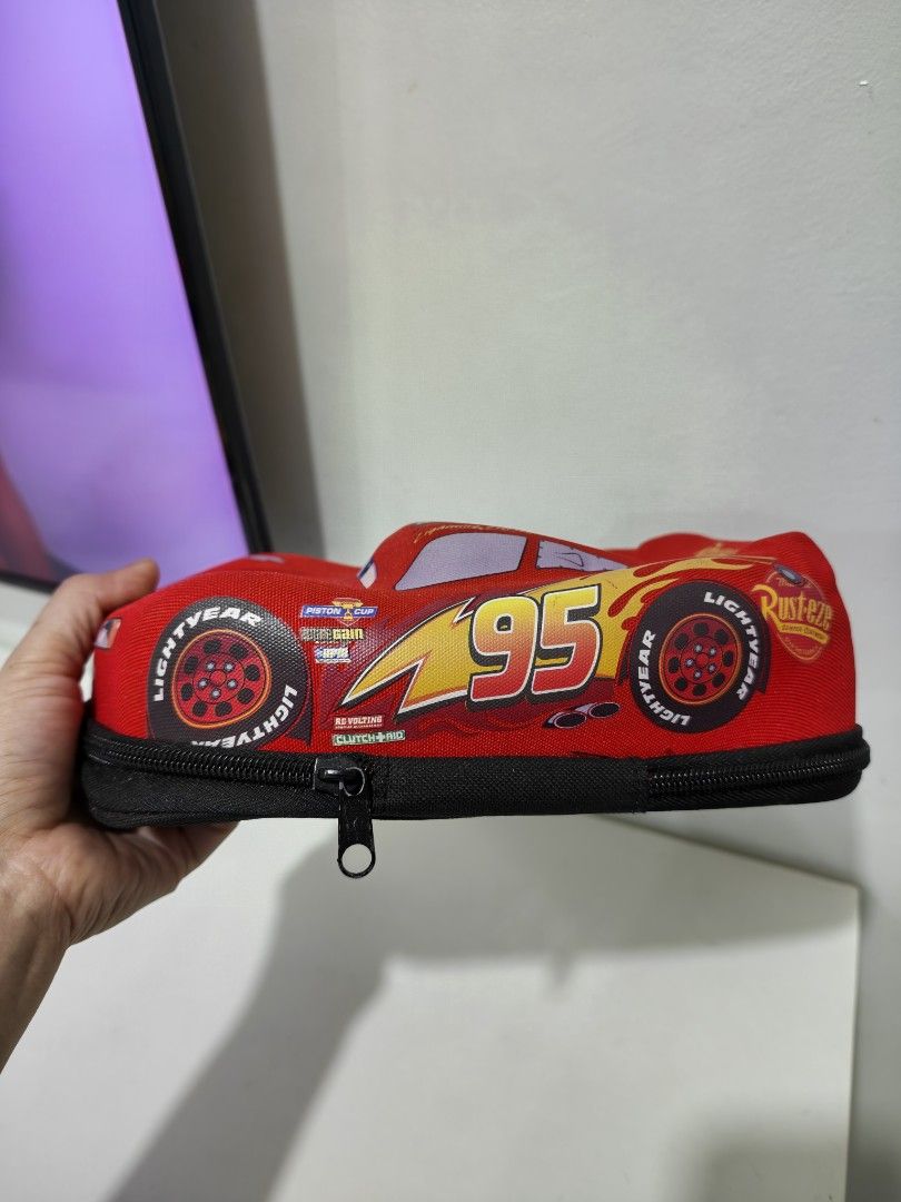 Preloved Lightning McQueen pencil case (Category: Stationery & School Supplies) located in Pasig City. Submitted by dian.juliet (Listing ID 1464224304, Image 3). Description: ▪️Preloved from USA ▪️With inkmark ▪️What you see is what you get. ▪️Colors may vary due to lightning. ▪️Flaws are barely noticeable. ▪️Feel free to message me for other details. :) 🖤 dian.