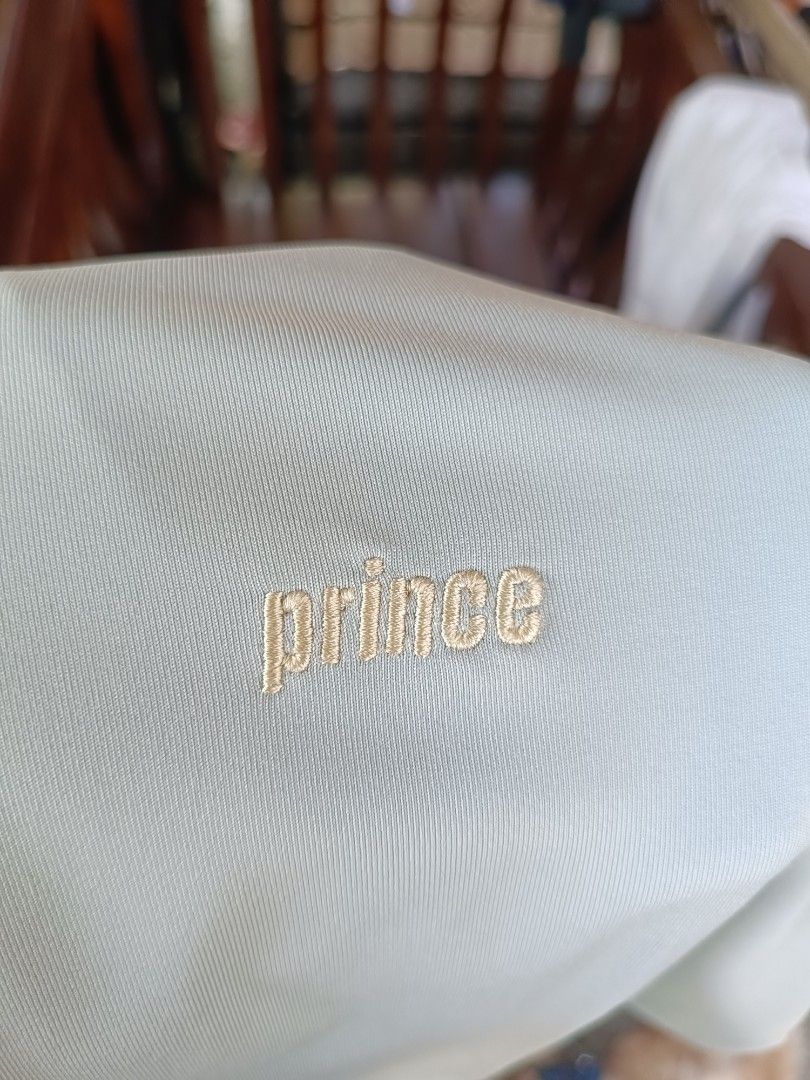 Prince Performance Wear Polo Shirt Light Blue (Category: Tshirts & Polo Shirts ) located in Urdaneta. Submitted by tetsudoubletaps (Listing ID 1464159095, Image 2). Description: + SF - Light blue Prince polo shirt - Features Prince's performance wear technology - Embroidered Prince logo on chest - Light cream colored collar - Made with Zelcon fabric - Ideal for sports or casual wear.