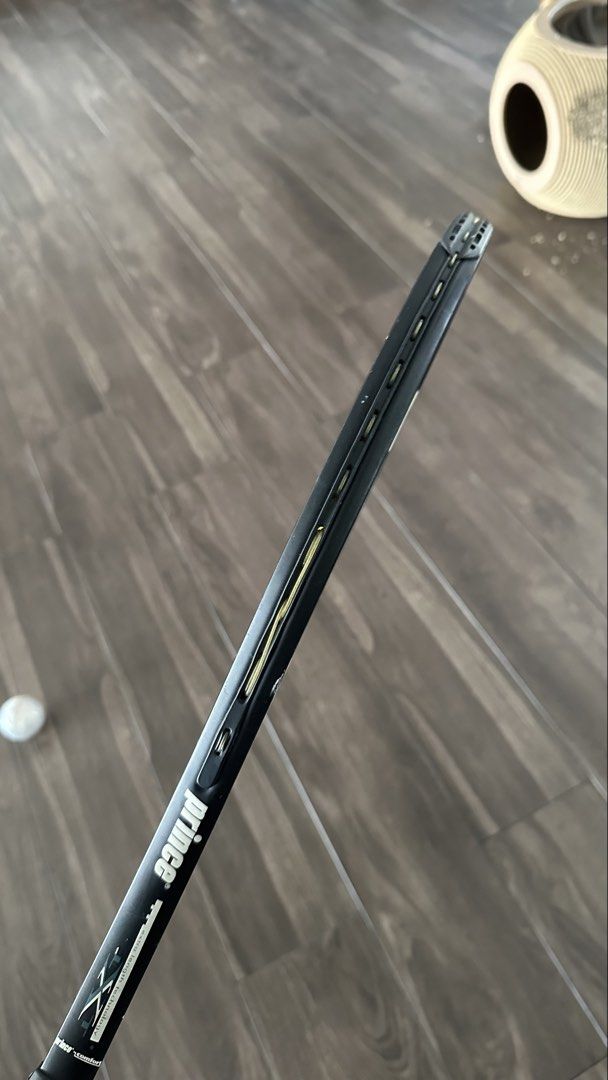 Prince Pro Series Tennis Racket (Category: Racket and Ball Sports) located in Manila. Submitted by waldorf024 (Listing ID 1464213755, Image 2). Description: - Prince Pro Series aluminum tennis racket - String Pattern: 16 mains / 19 crosses - Recommended Tension: 50-65 lbs - Currently Strung With: Prince Tournament Nylon - Condition: Good, with minor scuffs on the frame (original grip has been removed) .