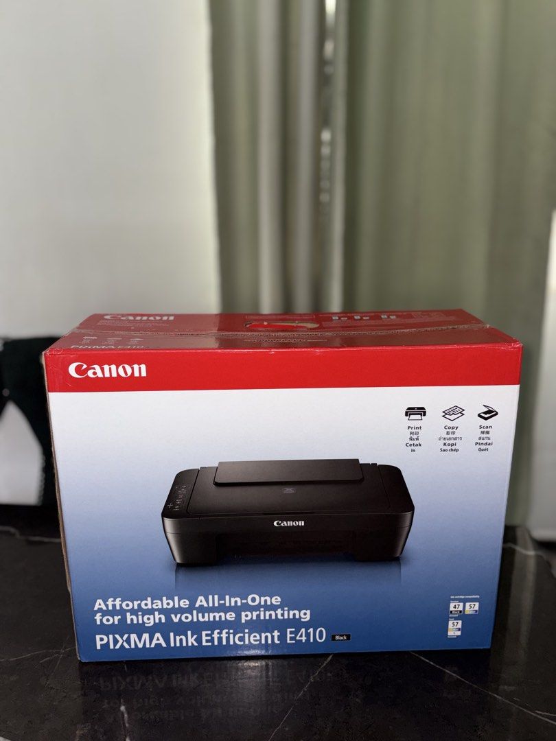 Printer E410 without ink (Category: Printers, Scanners & Copiers) located in Wakaf Bharu. Submitted by nurulhafif34619 (Listing ID 1464297743, Image 1). Description: NEW IN BOX.