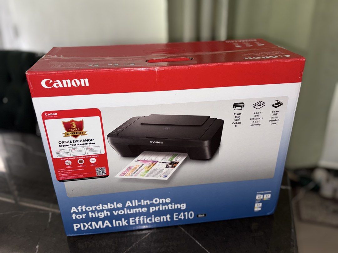 Printer E410 without ink (Category: Printers, Scanners & Copiers) located in Wakaf Bharu. Submitted by nurulhafif34619 (Listing ID 1464297743, Image 2). Description: NEW IN BOX.
