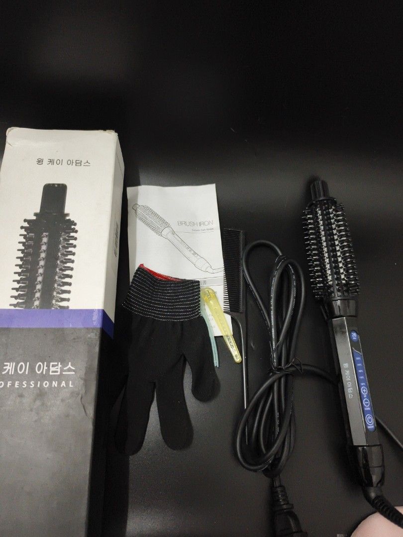Professional Hair Brush (Category: Hair) located in Angeles City. Submitted by measaliman02351 (Listing ID 1464258752, Image 2). Description: - Professional round styling brush - Achieve salon-quality volume and bounce - Ideal for home styling - Packaging features Korean text and 'PROFESSIONAL'.