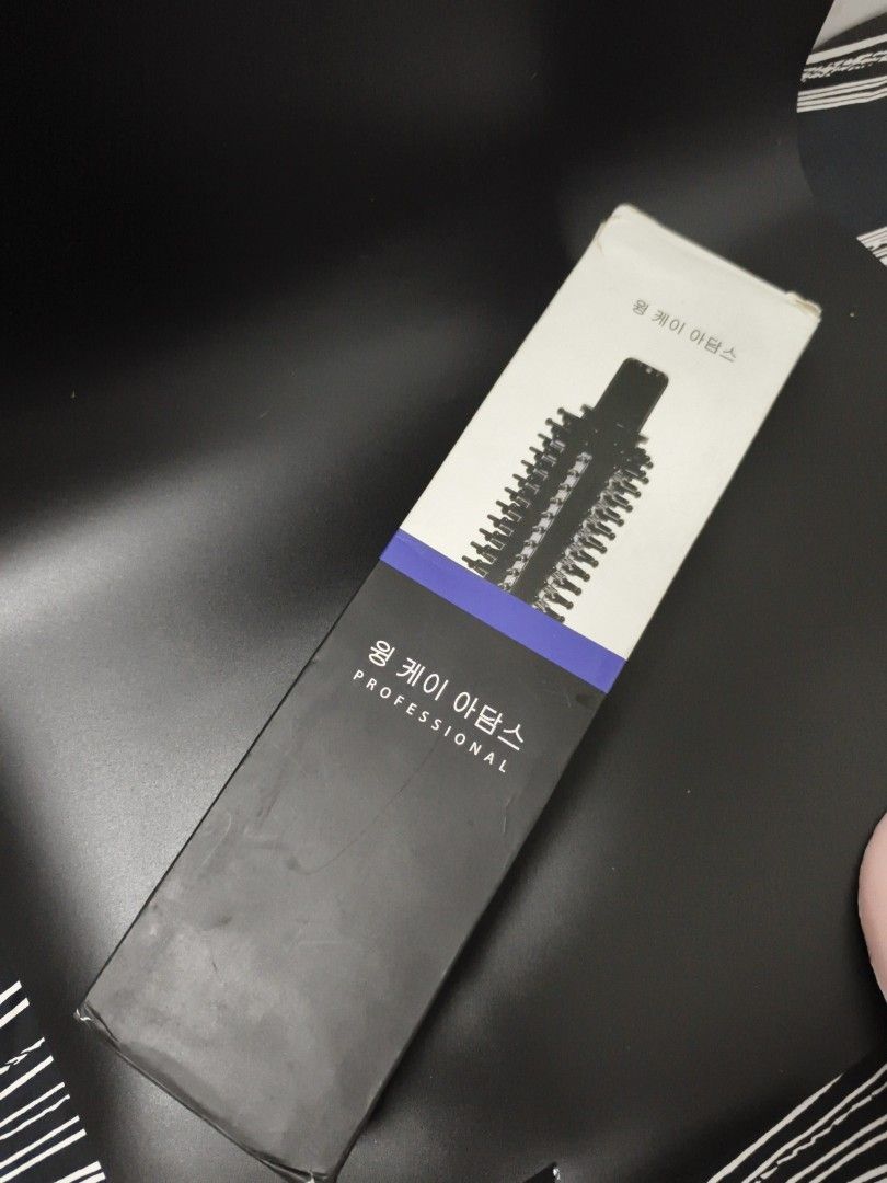 Professional Hair Brush (Category: Hair) located in Angeles City. Submitted by measaliman02351 (Listing ID 1464258752, Image 1). Description: - Professional round styling brush - Achieve salon-quality volume and bounce - Ideal for home styling - Packaging features Korean text and 'PROFESSIONAL'.