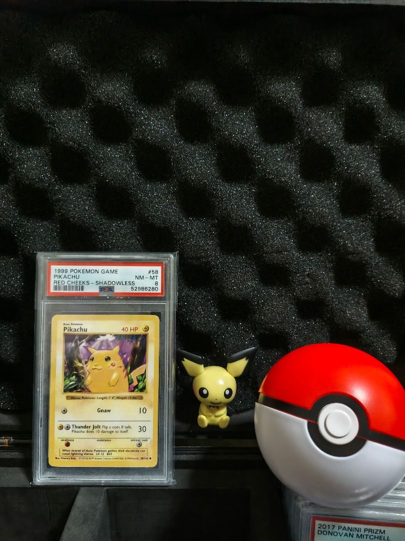 Pikachu 58 Rare (Category: Graded Singles) located in Cabuyao City. Submitted by icetruckkiller (Listing ID 1464202060, Image 2). Description: 1999 Pokémon Base Set Shadowless Pikachu #58 Red Cheeks variant — PSA 8 NM-MT Childhood card that I've owned for around 25 years. It was a gift from my dad and I personally sent it to PSA for grading during the pandemic. Price: ₱15,000 Can send more photos/videos upon request. Open to reasonable offers..