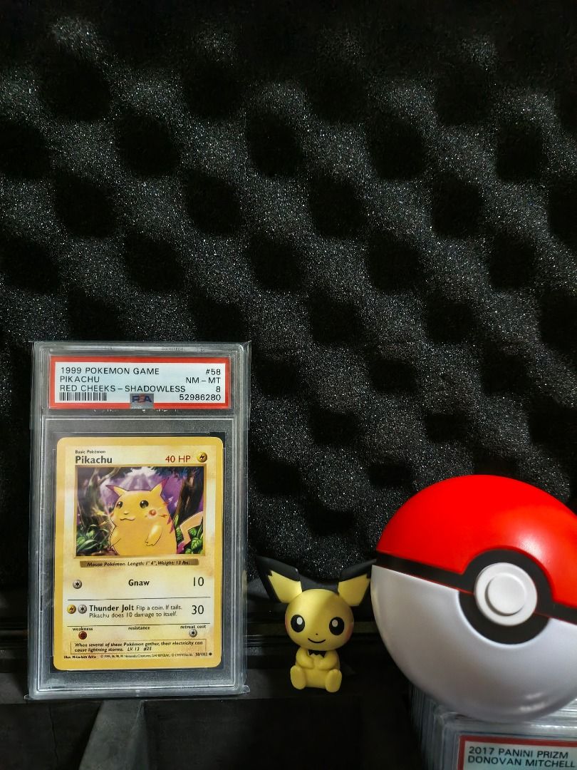 Pikachu 58 Rare (Category: Graded Singles) located in Cabuyao City. Submitted by icetruckkiller (Listing ID 1464202060, Image 1). Description: 1999 Pokémon Base Set Shadowless Pikachu #58 Red Cheeks variant — PSA 8 NM-MT Childhood card that I've owned for around 25 years. It was a gift from my dad and I personally sent it to PSA for grading during the pandemic. Price: ₱15,000 Can send more photos/videos upon request. Open to reasonable offers..