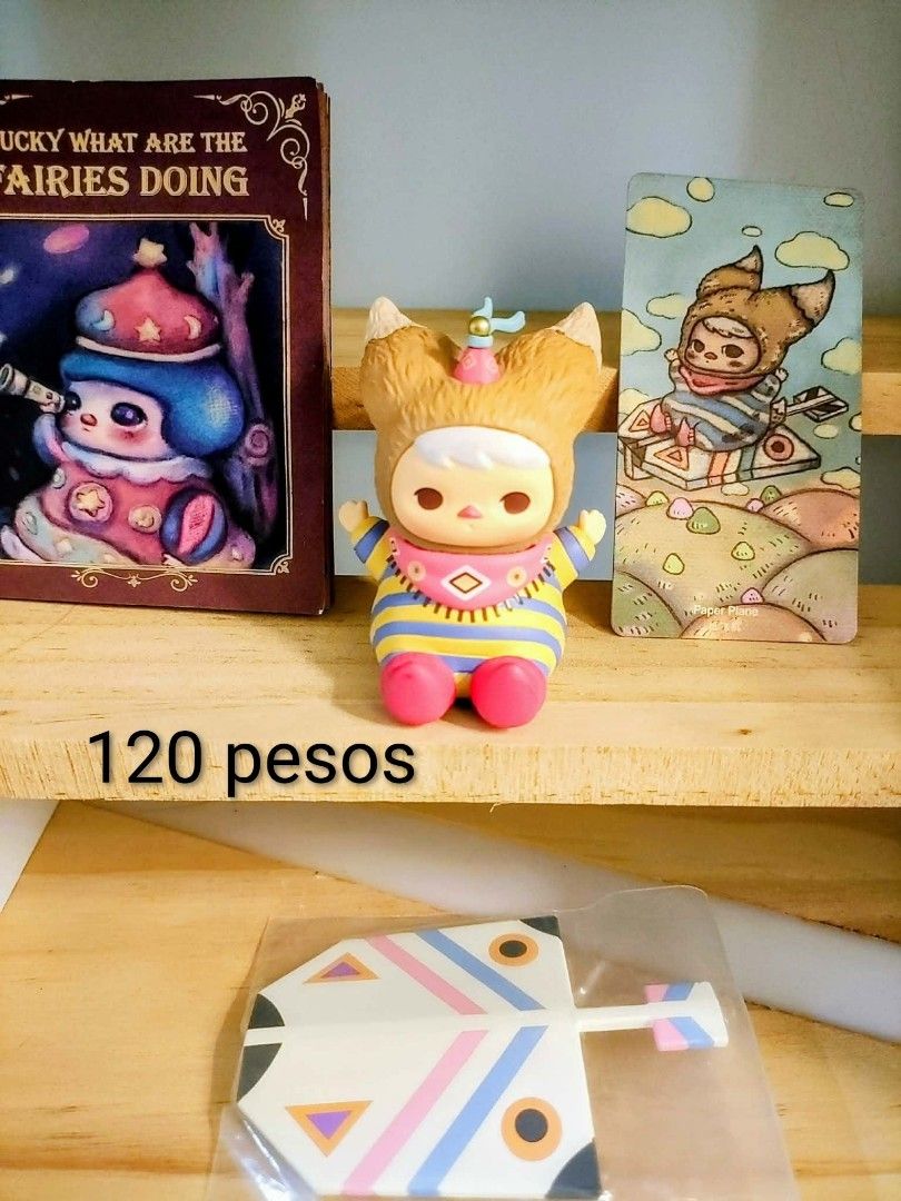 pucky Pop Mart Figures & Card Set (Category: Designer & Blind Box Toys) located in Caloocan City. Submitted by jark_moonshop (Listing ID 1464241852, Image 1). Description: - Adorable pucky figure set - Includes matching card - Book also included - Paper plane accessory included - Great for collectors - Price: 120 pesos for the entire set.