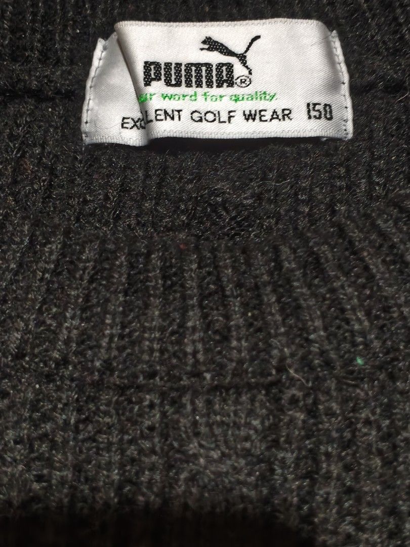PUMA Black Knitted Sweater (Category: Coats, Jackets and Outerwear) located in Baguio. Submitted by oberdosed (Listing ID 1464346489, Image 3). Description: PUMA Black Knitted Sweater A sporty yet elevated black knit with a slightly cropped, fitted silhouette. Measurements: Length: 19.5" | Width: 18" | Sleeves: 20".