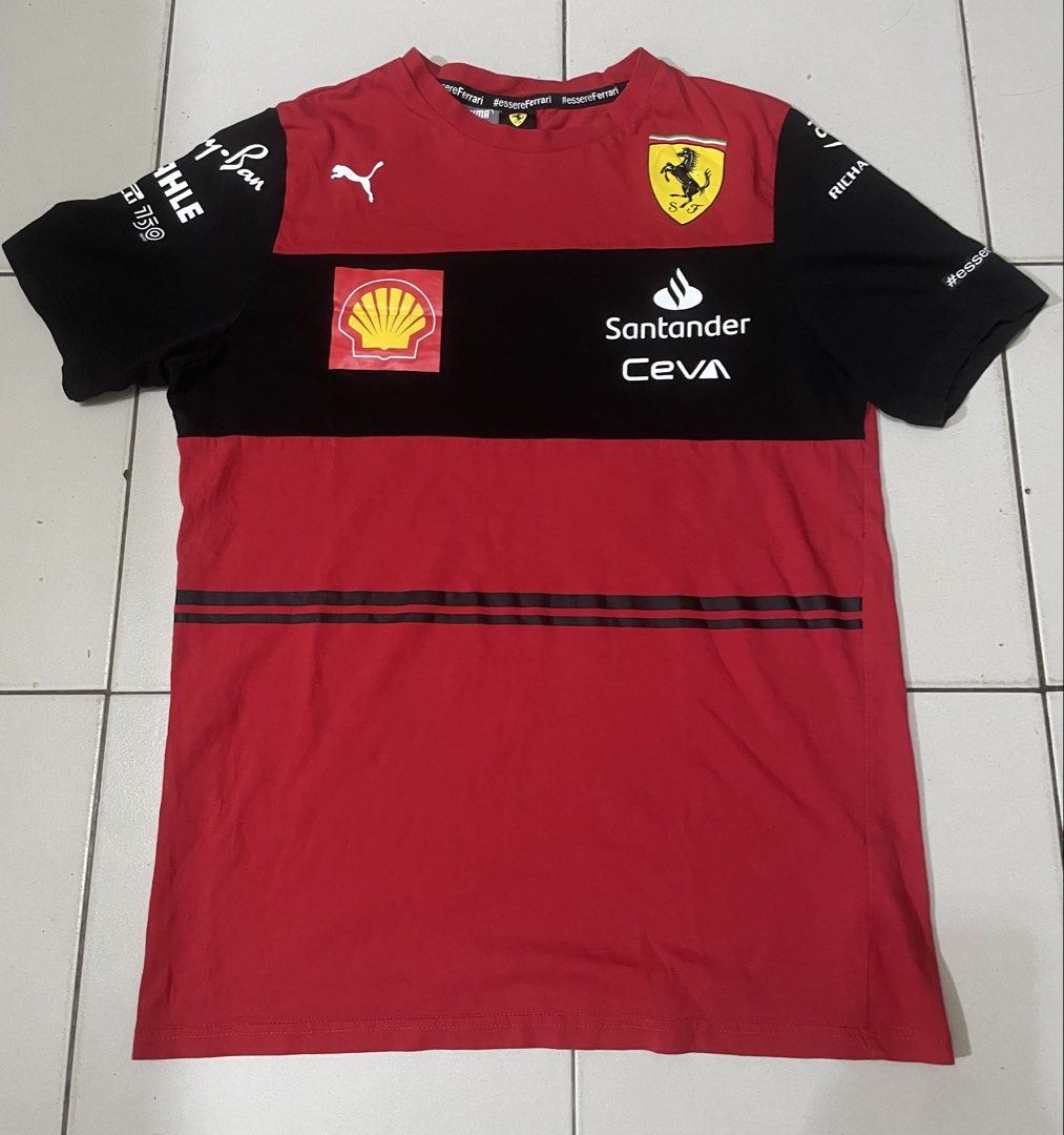 Puma Ferrari T-Shirt Size S (Category: Tshirts & Polo Shirts ) located in Manila. Submitted by sellingthings.xx (Listing ID 1464294381, Image 1). Description: - Authentic Red & Black Puma Ferrari T-shirt - Size: S - Features sponsor logos: Shell, Santander, CEVA - Sleeve details: Richard Mille and AWS logos - Color Rate: 9.5/10 - Dimes: Length 20 Width 26 - Issue: Crack Prints lang po - Condition: Good - Negotiable - Courier: Lalamove or pick up 