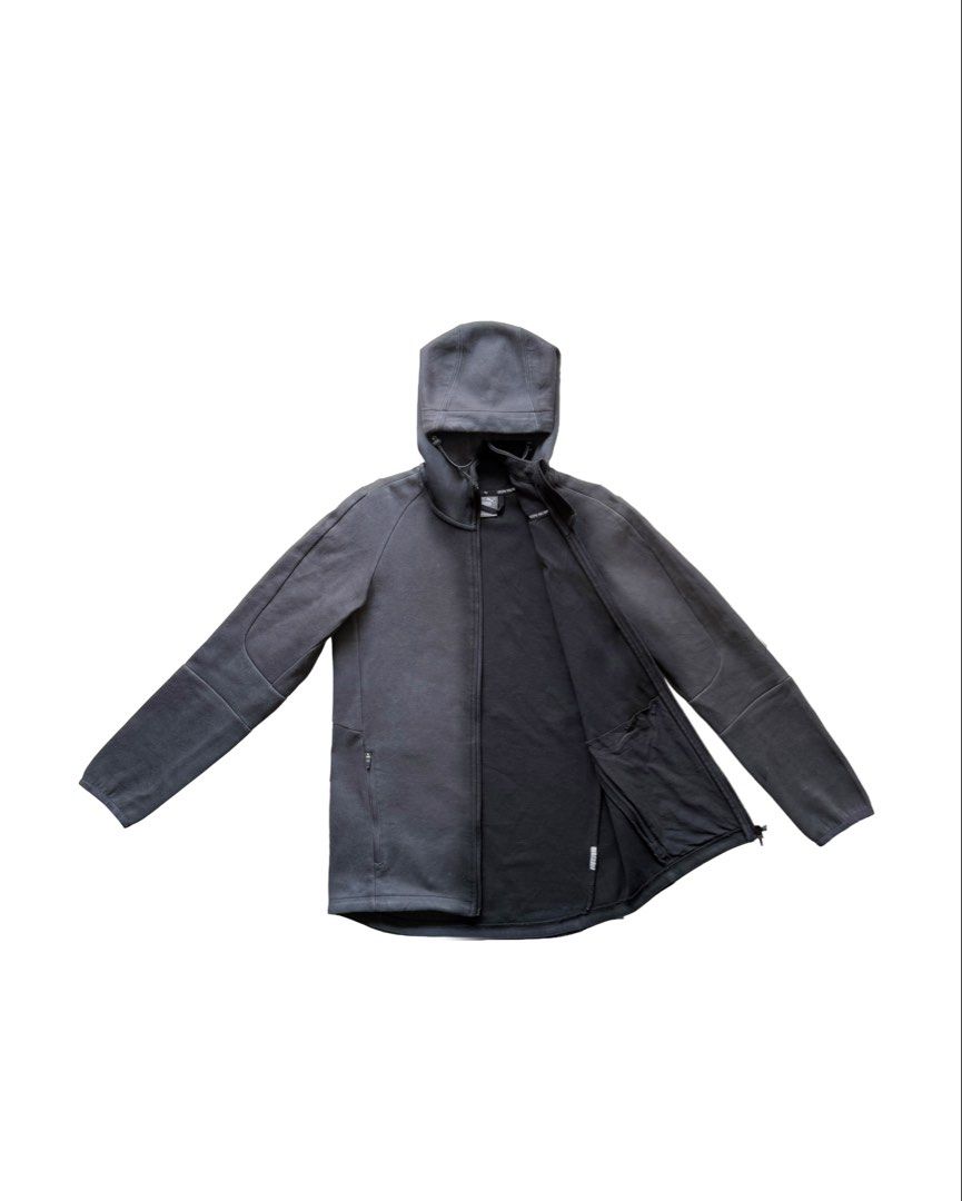 Puma Track Hooded Jacket (Category: Coats, Jackets and Outerwear) located in Manila. Submitted by morf_sply (Listing ID 1464303526, Image 2). Description: Athleisure jacket made of lightweight stretchable cotton fabric with adjustable high colar. Long sleeves with elasticated cuffs. Elasticated hem with zipped hip pockets. S on tag. Best fit M. Shoulder Width 17 in Pit to Pit 18.5 in Length 26 in Front 28 in Back Sleeves 22 in.