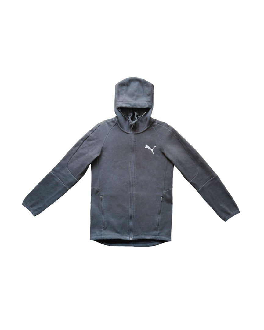 Puma Track Hooded Jacket (Category: Coats, Jackets and Outerwear) located in Manila. Submitted by morf_sply (Listing ID 1464303526, Image 1). Description: Athleisure jacket made of lightweight stretchable cotton fabric with adjustable high colar. Long sleeves with elasticated cuffs. Elasticated hem with zipped hip pockets. S on tag. Best fit M. Shoulder Width 17 in Pit to Pit 18.5 in Length 26 in Front 28 in Back Sleeves 22 in.
