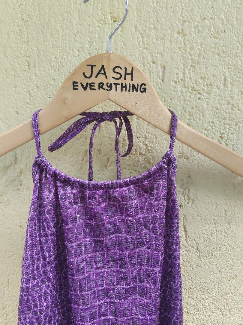 Purple Crocodile Print Halter Top (Category: Sleeveless) located in City of Isabela. Submitted by jasheverything (Listing ID 1464140190, Image 2). Description: - Adorable purple halter top - Unique crocodile print - Features a subtle shimmer in the fabric - Ties at the neck for an adjustable fit - Ideal for parties, festivals, or a fun night out - Flirty and eye-catching design Excellent Condition S to M 550+SF.