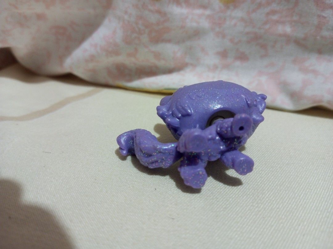 Purple Glitter Cat Toy Figure (Category: Designer & Blind Box Toys) located in Victorias. Submitted by tobylacua26871 (Listing ID 1464270601, Image 3). Description: - Adorable purple glitter cat toy - Features a sparkly finish all over - Cute big eyes and a fluffy tail - Perfect for collectors or as a fun toy.