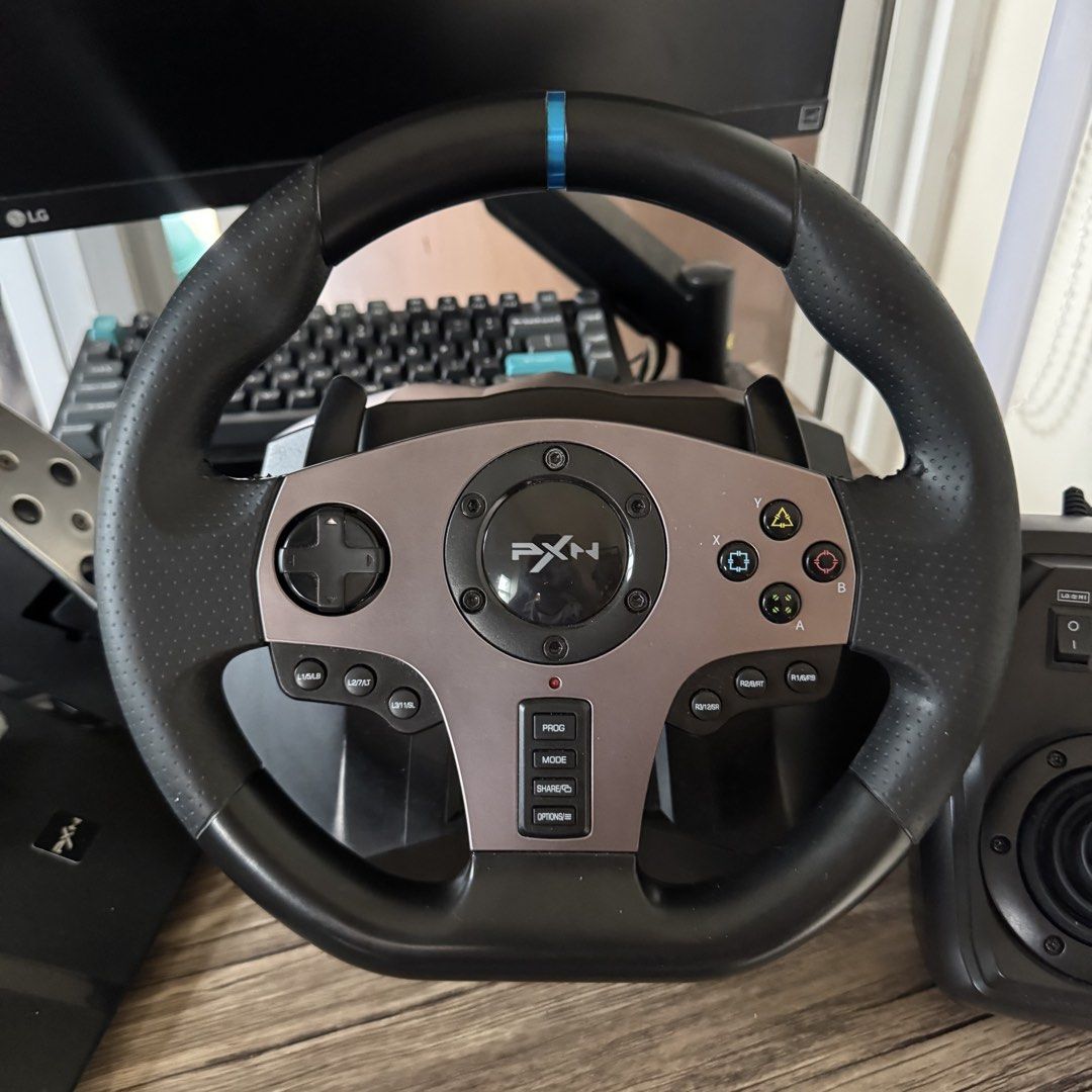 PXN V9 Racing Wheel PS4 PC XBOX NINTENDO SWITCH (Category: Controllers) located in Quezon City. Submitted by consoleciety (Listing ID 1464244054, Image 2). Description: PXN V9 Gen 1 Racing Wheel for sale ₱4,500 —complete set: wheel, pedals, shifter, clamp, and box (worn out box) —compatible with PC (Windows 7/8/10/11), PS4, PS3, Xbox One, Xbox Series X/S, and Nintendo Switch see pics for condition note: need mo tigasan yung pag-shift sa gear 1 ka