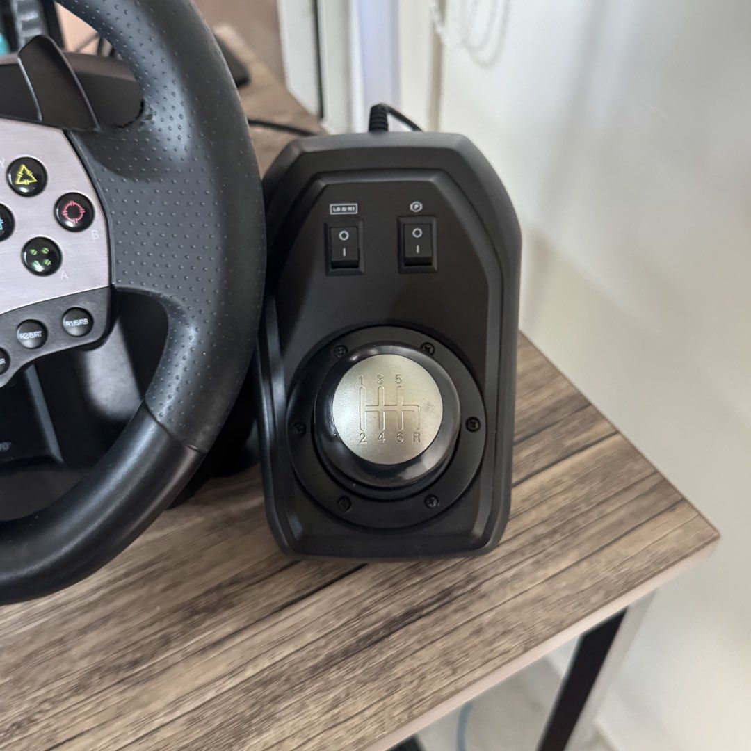 PXN V9 Racing Wheel PS4 PC XBOX NINTENDO SWITCH (Category: Controllers) located in Quezon City. Submitted by consoleciety (Listing ID 1464244054, Image 3). Description: PXN V9 Gen 1 Racing Wheel for sale ₱4,500 —complete set: wheel, pedals, shifter, clamp, and box (worn out box) —compatible with PC (Windows 7/8/10/11), PS4, PS3, Xbox One, Xbox Series X/S, and Nintendo Switch see pics for condition note: need mo tigasan yung pag-shift sa gear 1 ka