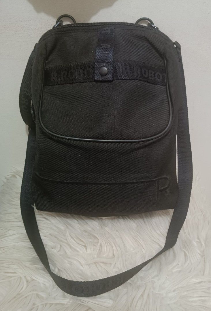 R. Robot Crossbody Bag (Category: Cross-body Bags) located in Davao. Submitted by naxarugal (Listing ID 1464168969, Image 1). Description: ukay source no issue size length 8.3:inches width 3 inches height 11.5 inches.