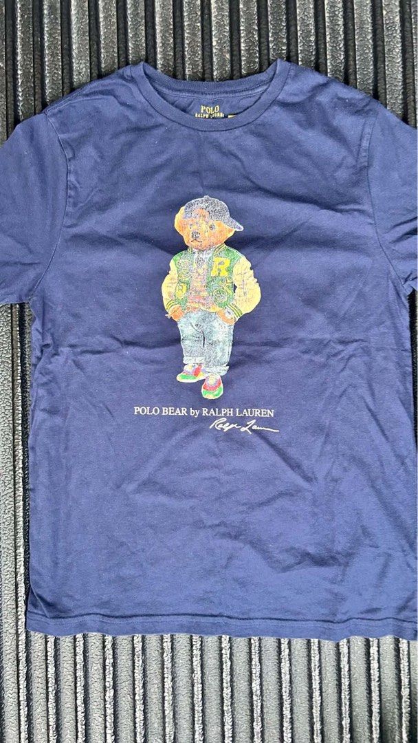 Ralph Lauren Polo Bear Cotton Jersey Tee (Category: Shirts) located in Taguig. Submitted by arichivedvault (Listing ID 1464156207, Image 2). Description: Cotton jersey tee, the iconic Polo Bear wears a signature Ralph Lauren look Cracked prints -gives of Vintage-y Vibe Dimensions W-16inches L-24inches Size M-Semi L (Women’s) 100% Authentic Scan the QR Code to see the shirt details in the RL website .