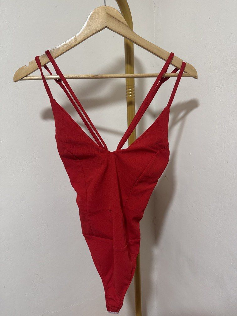 Red Sleeveless Bodysuit (Category: Others Tops) located in Mexico. Submitted by studioleraph (Listing ID 1464239292, Image 1). Description: 🛍️ Perfect for your personal wardrobe 🫶 👗 The actual item being sold is the original garment shown in the product photos. Small differences in fit, drape, color, texture, or details may occur. 💌 Condition: • Preloved; Please wash the items before wearing. • Please manage expectations as these are vintage/