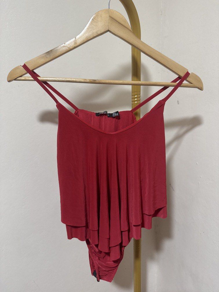 Red Sleeveless Bodysuit (Category: Others Tops) located in Mexico. Submitted by studioleraph (Listing ID 1464270216, Image 1). Description: 🛍️ Perfect for your personal wardrobe 🫶 👗 The actual item being sold is the original garment shown in the product photos. Small differences in fit, drape, color, texture, or details may occur. 💌 Condition: • Preloved; Please wash the items before wearing. • Please manage expectations as these are vintage/