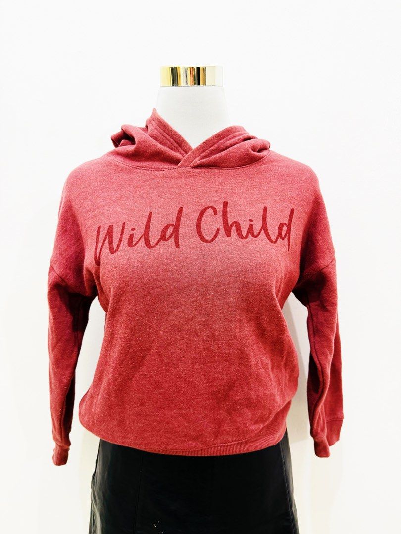 Red "Wild Child" Graphic Hoodie (Category: Hoodies) located in Manila. Submitted by e.louise (Listing ID 1464334407, Image 1). Description: - Cute red hoodie - Features 'Wild Child' graphic - Comfy and casual design - Ideal for everyday wear - Effortlessly pairs with jeans or leggings - Creates a relaxed vibe.
