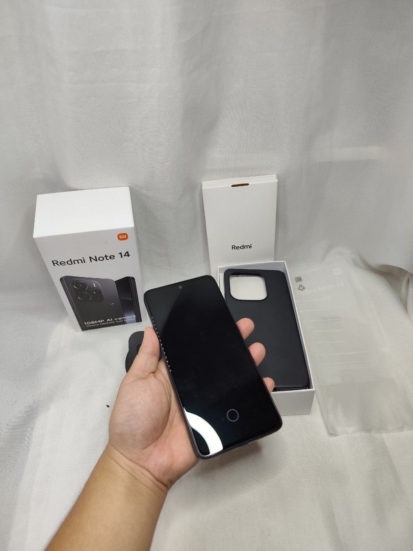 Redmi Note 14 4G 6/128 (Category: Xiaomi) located in Manila. Submitted by buhawimari11037 (Listing ID 1464330118, Image 3). Description: Good as new No issue all parts are original low battery cycle count complete Original box original case original adapter 33w and cable Meet up: Mindanao ave. St.James 7-eleven.