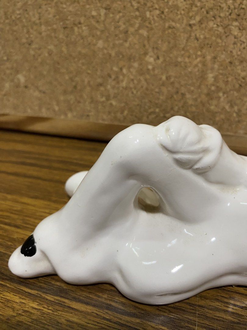 Retro 1980s White Ceramic Pierrot Figurine (Category: Figurines & Statues) located in Calamba. Submitted by chebvintagedepot (Listing ID 1464245247, Image 3). Description: [B19-01] This white glossy ceramic Pierrot figurine is posed lying on its side with one knee raised. It wears a classic black cap and a ruffled frilly collar, giving it a distinctive theatrical look. The design has a retro 1980s interior décor feel with Art Deco-inspired stylin