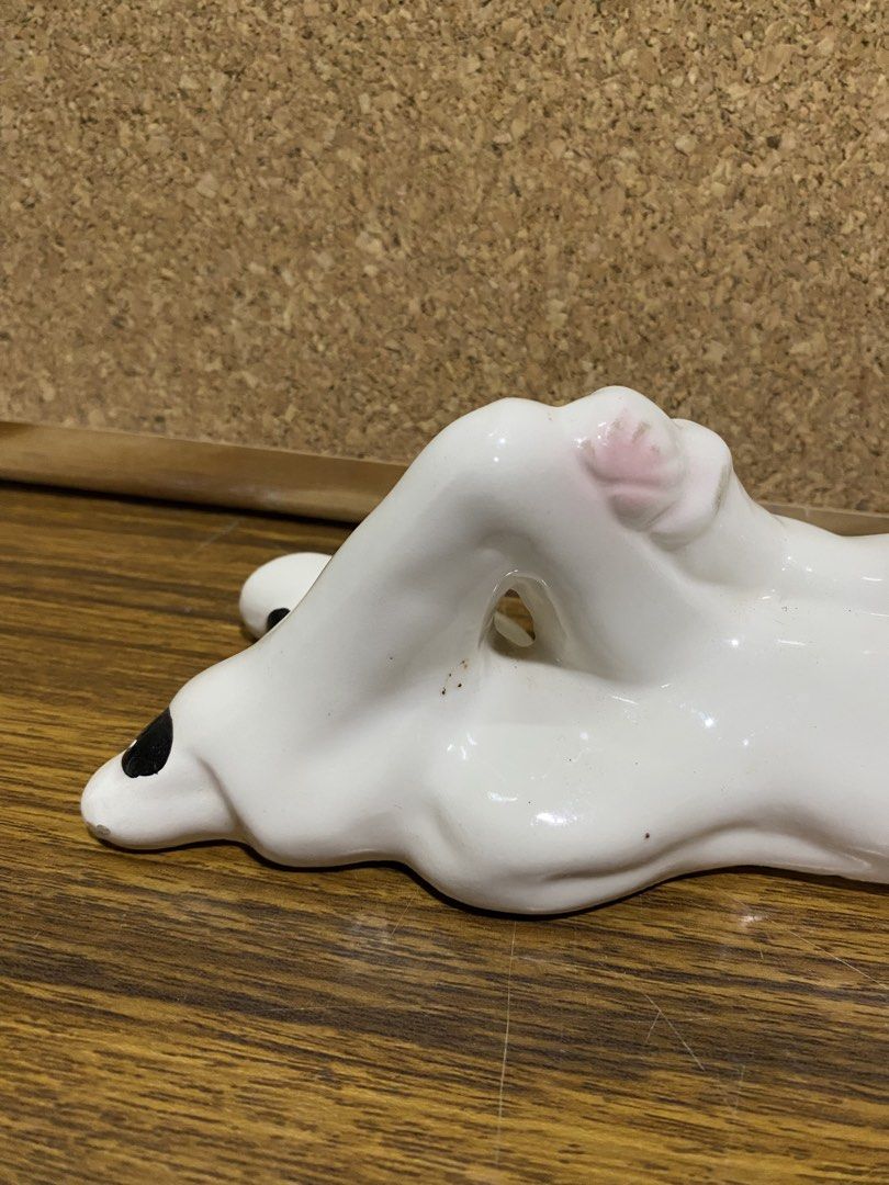 Retro 1980s White Ceramic Pierrot Figurine (Category: Figurines & Statues) located in Calamba. Submitted by chebvintagedepot (Listing ID 1464245246, Image 3). Description: [B19-02] This white glossy ceramic Pierrot figurine is posed lying on its side with one knee raised. It wears a classic black cap and a ruffled frilly collar, giving it a distinctive theatrical look. The design has a retro 1980s interior décor feel with Art Deco-inspired stylin