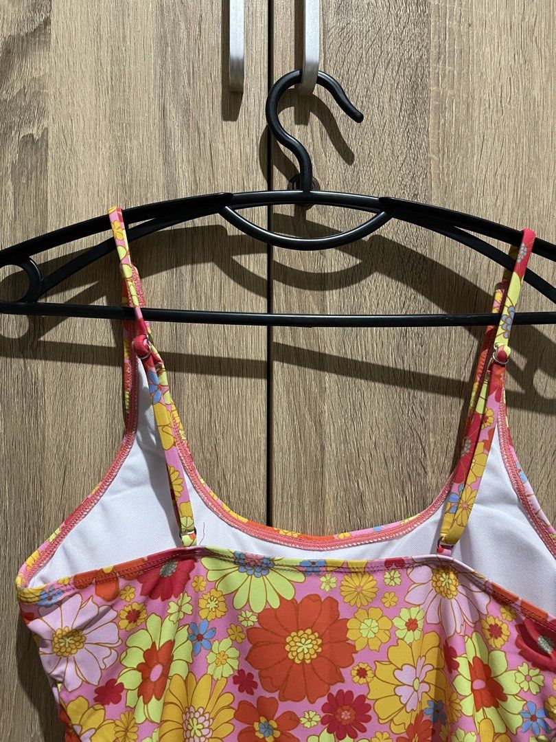 Retro Floral One-Piece Swimsuit (Category: Bikinis & Swimsuits) located in Manila. Submitted by preloveditems_jem (Listing ID 1464305016, Image 3). Description: Super cute one-piece swimsuit with a vibrant retro floral print. Pink, orange, yellow, and blue flowers all over. Features adjustable straps for a good fit. High-cut leg design. With removable padding. Great for the beach or pool. Ready for your next vacation!.