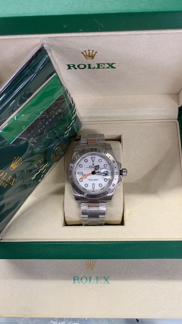 Rolex Explorer II (Category: Luxury Watches) located in Caloocan City. Submitted by mrbigdreams (Listing ID 1464242148, Image 3). Description: - Rolex Explorer II - White dial with distinctive orange GMT hand - Durable stainless steel Oyster bracelet - Comes complete with original box and papers - Ideal for adventurers and serious watch collectors.
