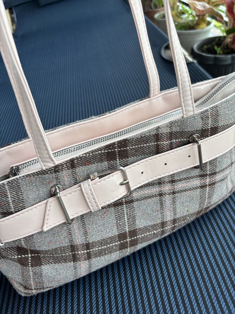 Rottique Dolly Check Bag (Category: Tote Bags) located in Baguio. Submitted by pinkynj (Listing ID 1464214351, Image 2). Description: - Adorable tote bag with a chic beige and pink plaid pattern - Features a stylish buckle detail on the front - Secure zip closure at the top - Interior includes some compartments for organization - Ideal for everyday errands and activities - Used once only - Original Price: 3,600.