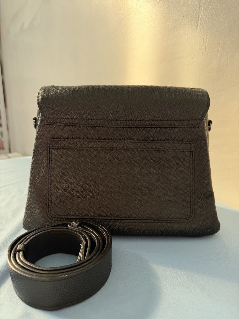 Rouge & Lounge Spirito Eclipse (Category: Cross-body Bags) located in Manila. Submitted by meldydsant58389 (Listing ID 1464211586, Image 2). Description: Rouge & Lounge Spirito Eclipse Released: Last 2017 (Original price before 24k to 35k) Condition: Like New Selling Price: 2,000 (nego) Rouge & Lounge Spirito Eclipse bag features a distinctive fine-grain pebbled (caviar-like) texture with a slightly semi-gloss finish. Super nice leather as in! 👌