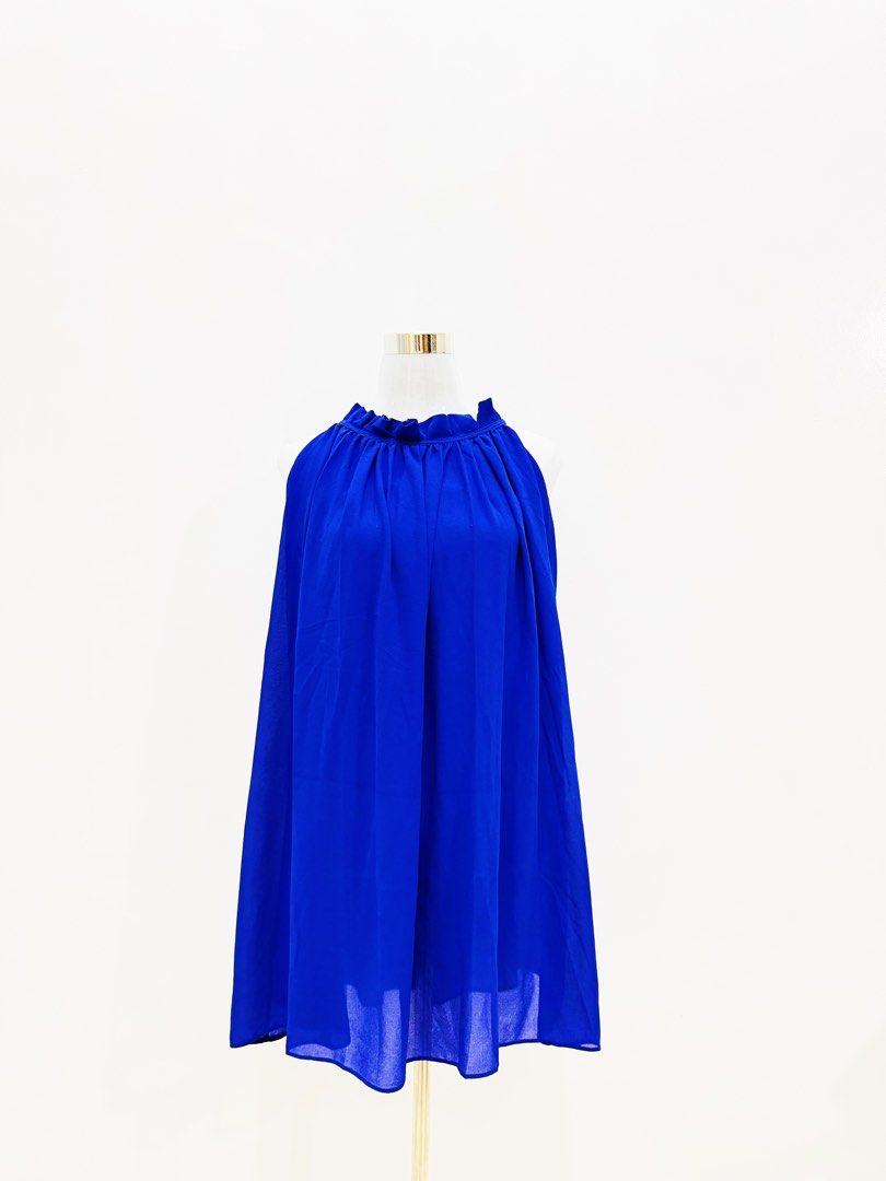 Royal Blue Halter Neck Ruffle Dress (Category: Dresses) located in Manila. Submitted by e.louise (Listing ID 1464332964, Image 2). Description: - Flowy royal blue dress - Halter neck with ruffled collar - Beautifully draping fabric - Ideal for parties or a night out - Chic and stylish.