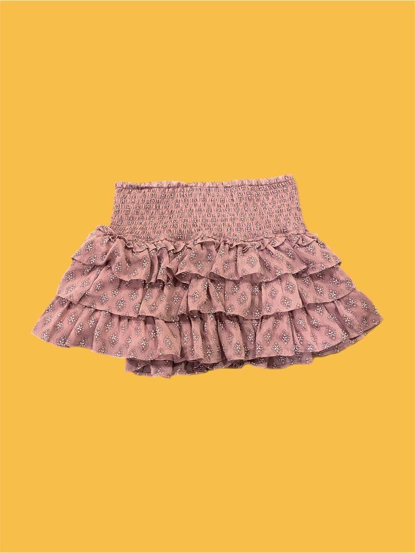 Rusty pink ruffled mini skort (Category: Skirts) located in Pasig City. Submitted by s0phiesells (Listing ID 1464169839, Image 1). Description: Used only once or twice, super good condition! Fits xs-s because it has a stretchy waistband:).